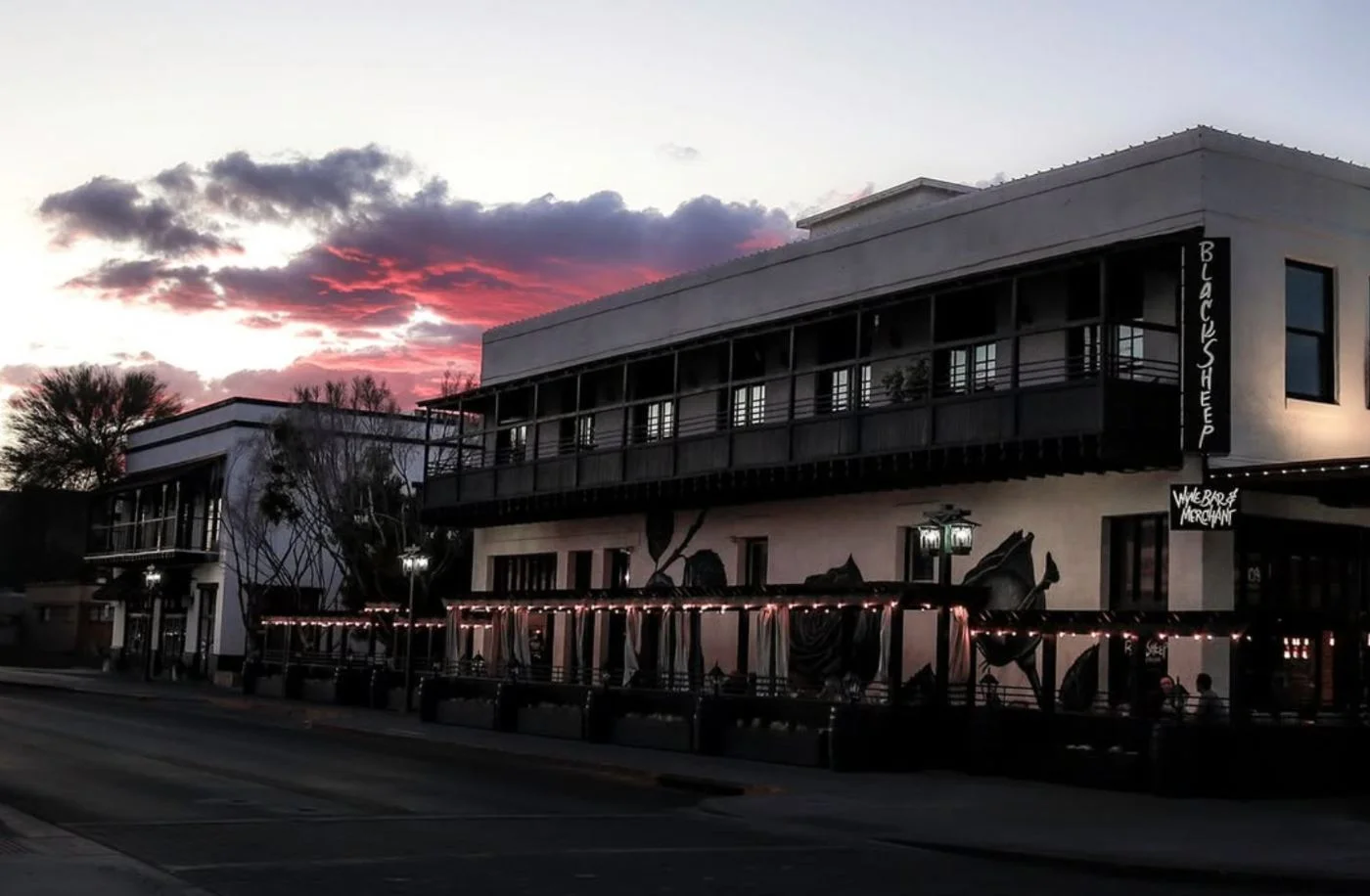 BlackSheep Wine Bar & Merchant at sunset, with string lights above the patio
